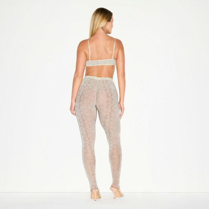 MILKY SHEER FOOTED LEGGING