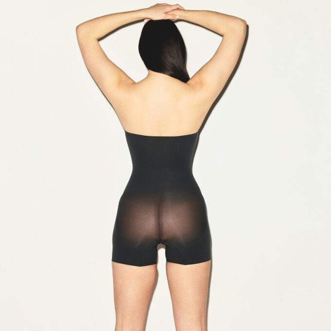 SHEER SEAMLESS STRAPLESS SHORTIE BODYSUIT