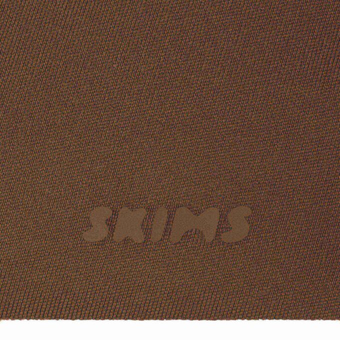 SKIMS ULTIMATE BODY PUSH-UP THONG BODYSUIT